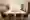 A conference room in the Hotel Ritter with tables arranged in a U-shape and chairs around them. Drinks and glasses as well as notepads and pens are ready and waiting.